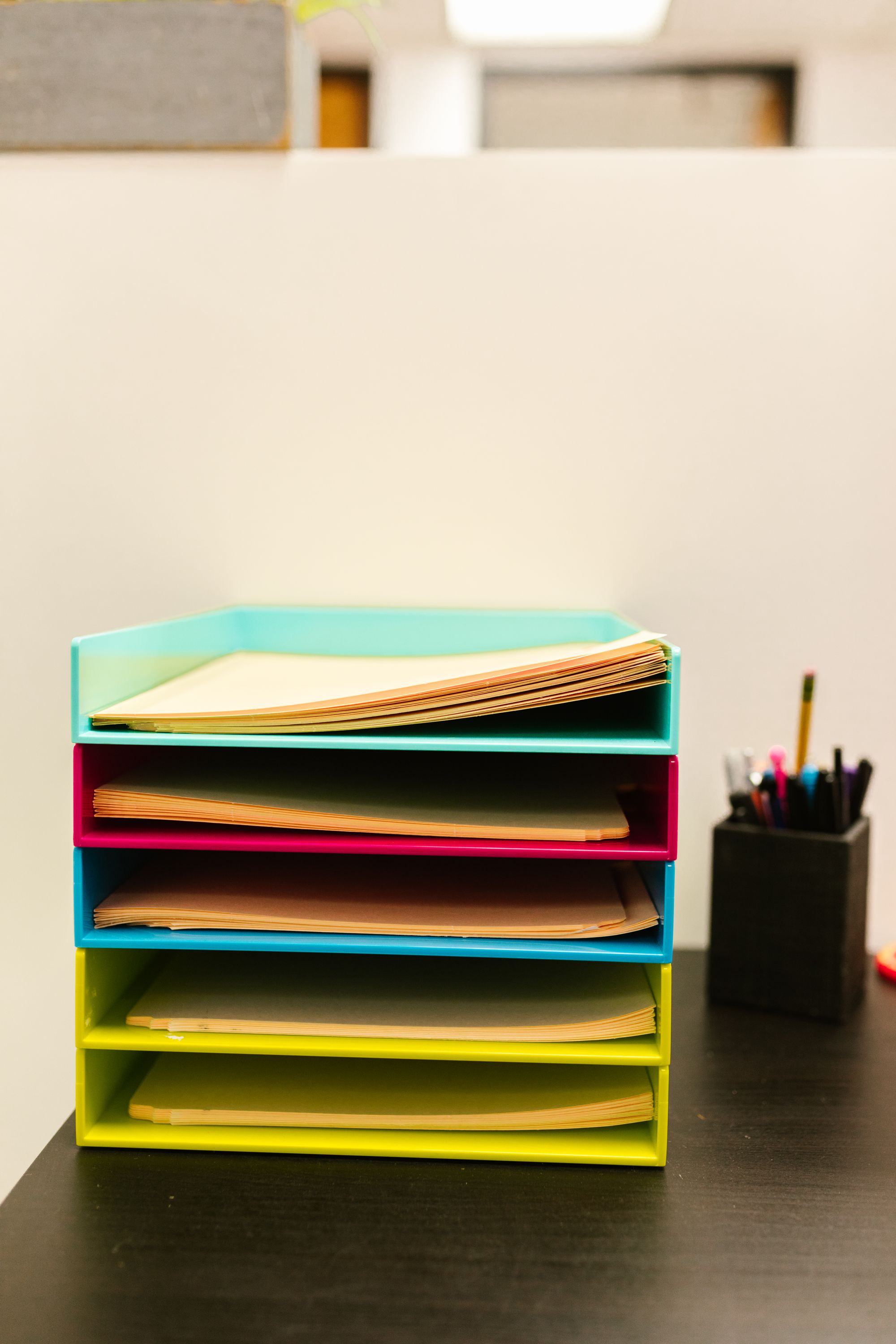 Organised paper trays for filing financial records